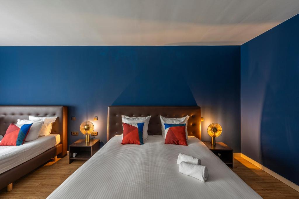 Postel nebo postele na pokoji v ubytování Hotel Onderbergen