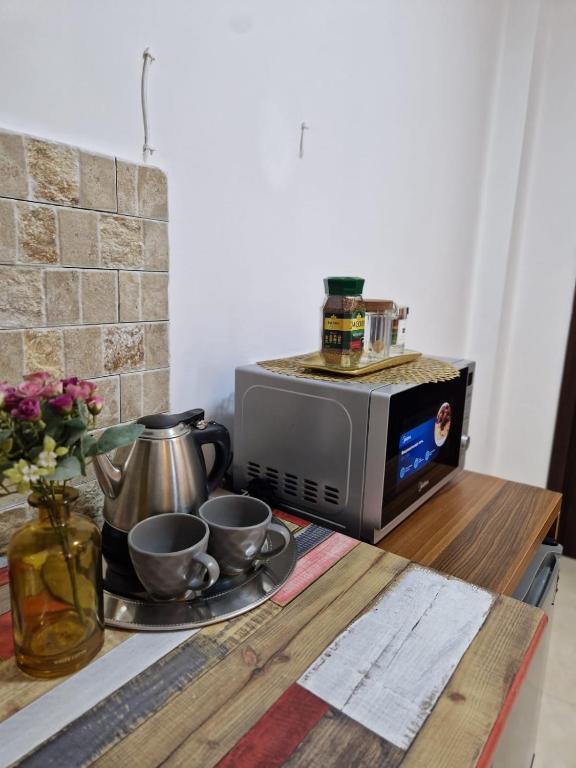 TV a/nebo společenská místnost v ubytování New House Kobuleti 2