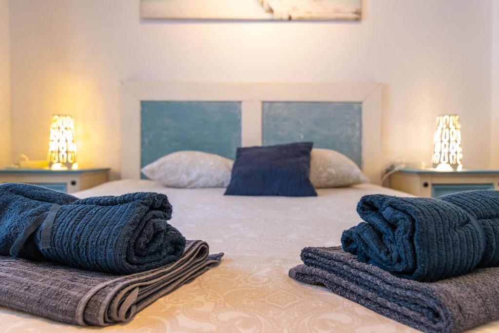 Postel nebo postele na pokoji v ubytování Parisito beach