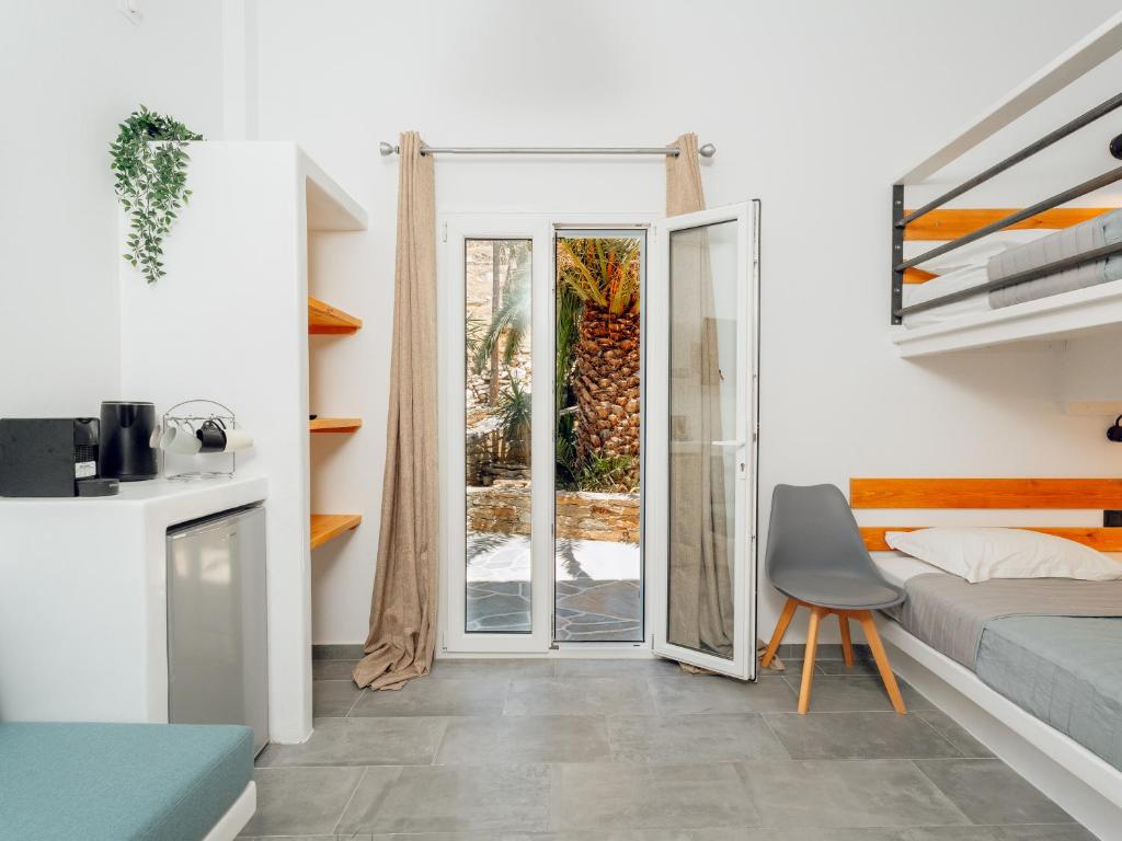 Postel nebo postele na pokoji v ubytování MARIAS PLACE IOS