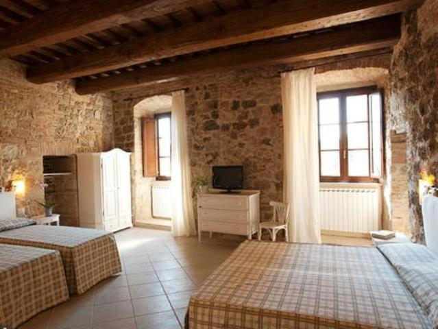 Letto o letti in una camera di Arnolfo B&B