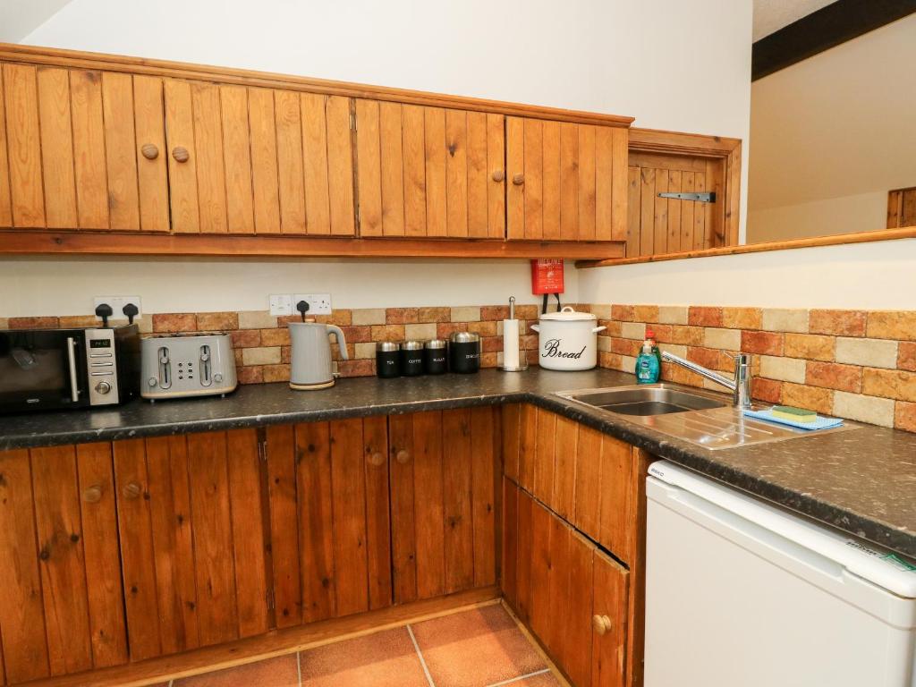 Kuchyň nebo kuchyňský kout v ubytování The Steading