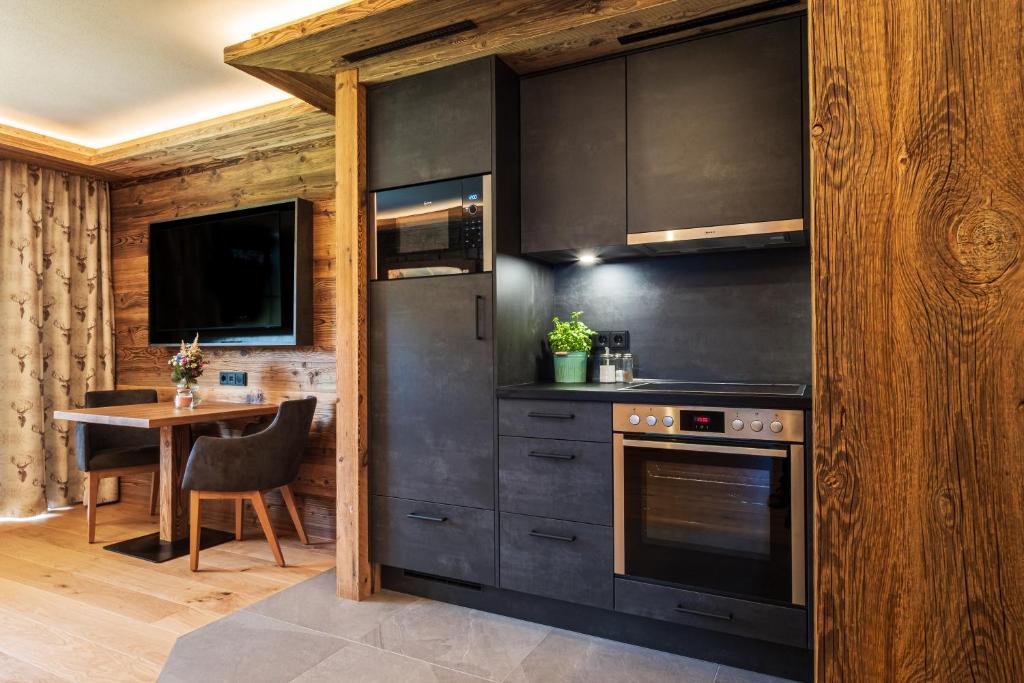 Kuchyň nebo kuchyňský kout v ubytování Appartements Hochödlehen