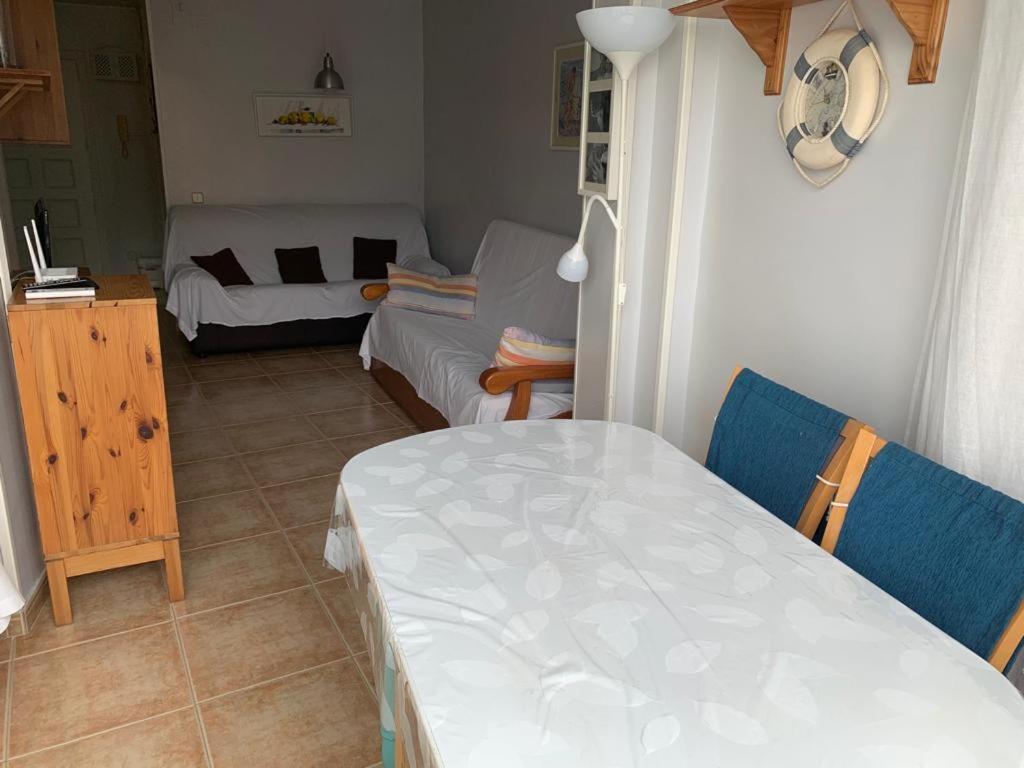 A bed or beds in a room at SERVICE APART LAZARO - Aguamarina 1 dormitorio