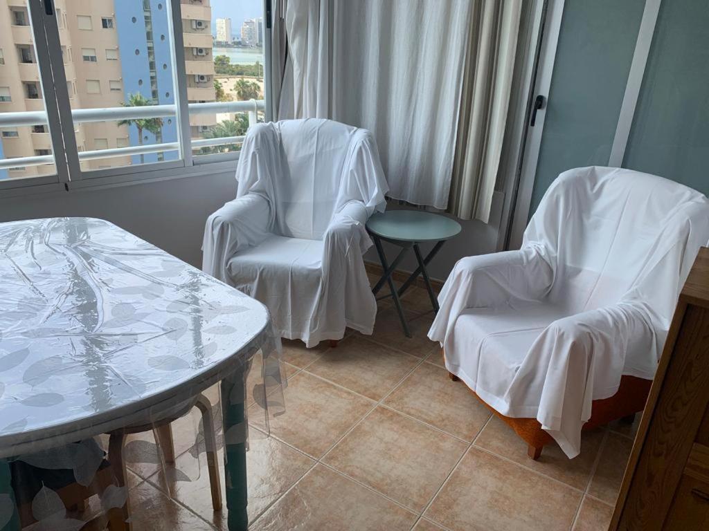 A seating area at SERVICE APART LAZARO - Aguamarina 1 dormitorio