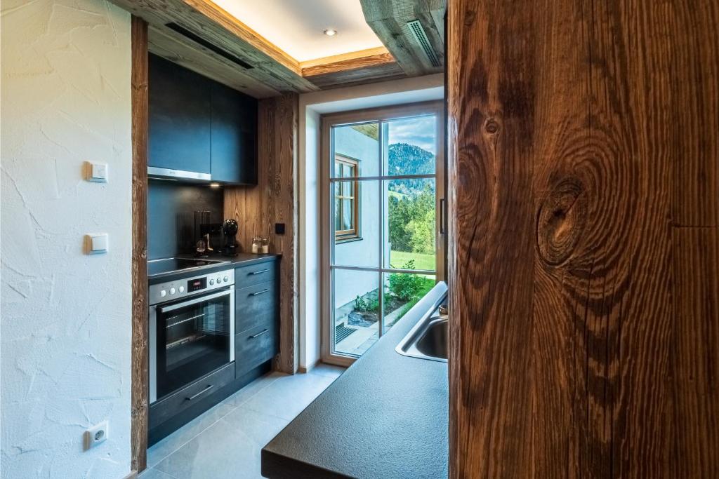 Kuchyň nebo kuchyňský kout v ubytování Appartements Hochödlehen
