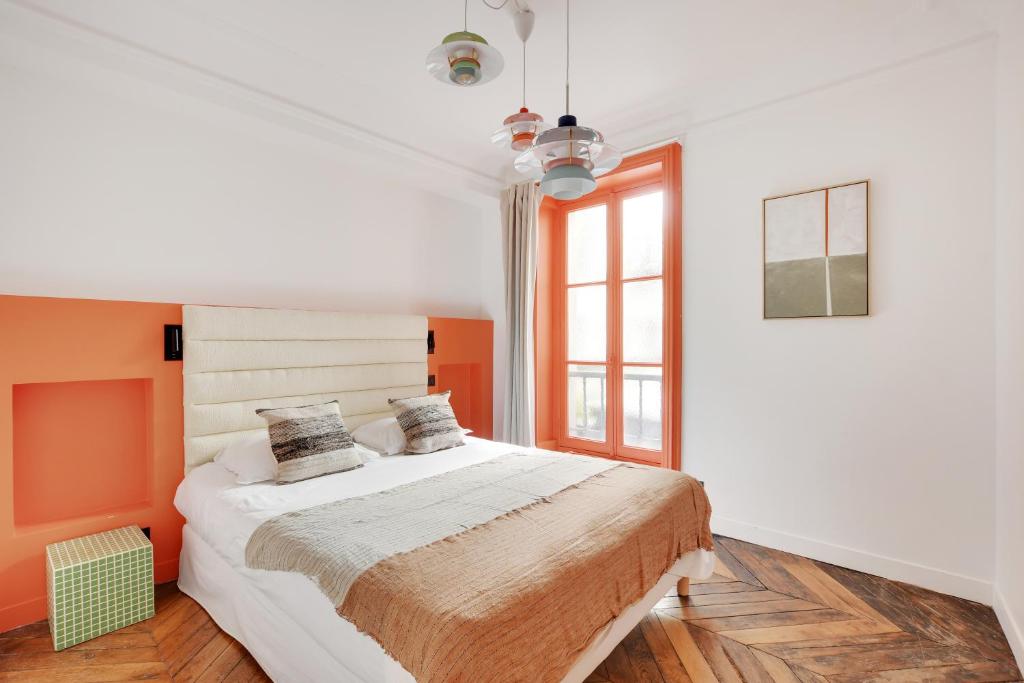 Posteľ alebo postele v izbe v ubytovaní Parisian Luxury & Charm - St Germain