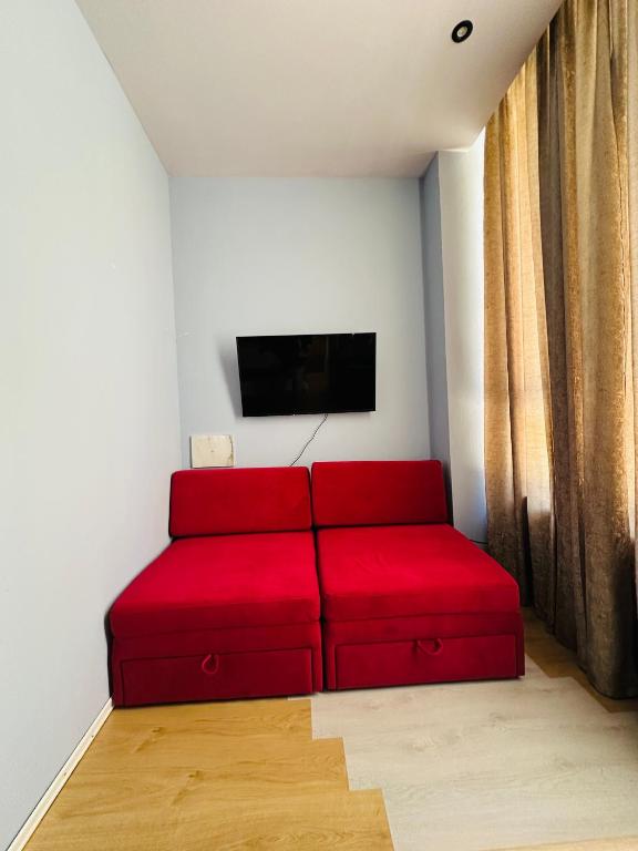 TV a/nebo společenská místnost v ubytování Colombia Apartments&Rooms
