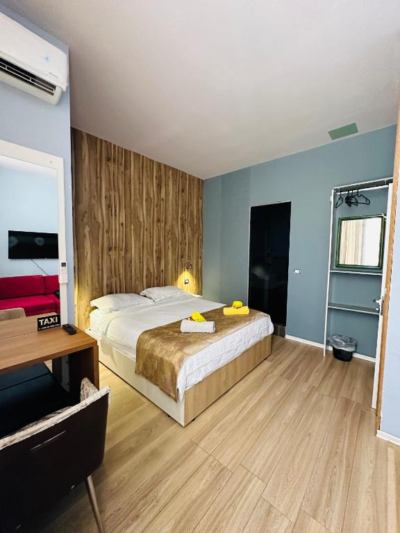 Postel nebo postele na pokoji v ubytování Colombia Apartments&Rooms