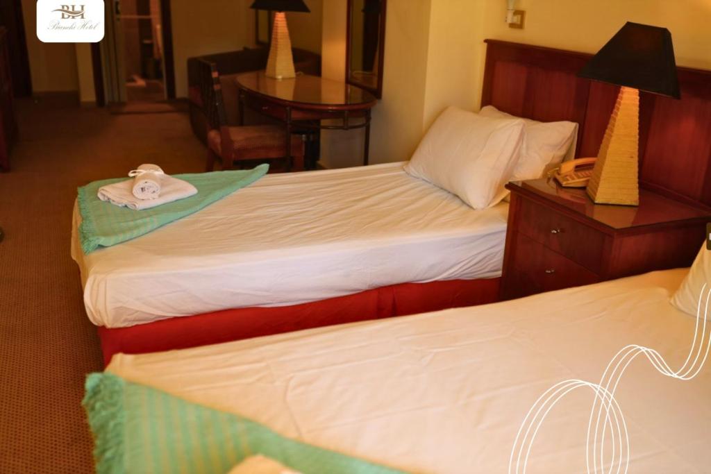 Postel nebo postele na pokoji v ubytování Bianchi Hotel
