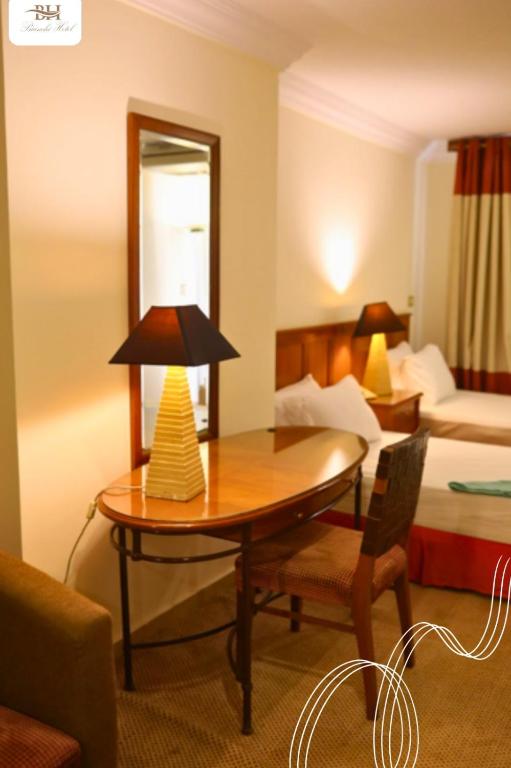 Postel nebo postele na pokoji v ubytování Bianchi Hotel