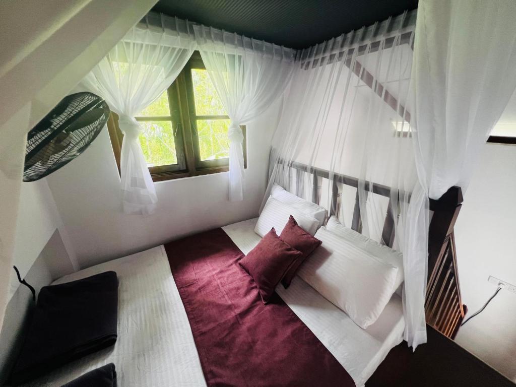 Postel nebo postele na pokoji v ubytování Rest Full Homestay