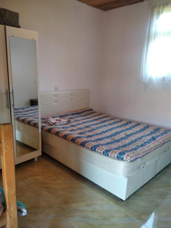 Postel nebo postele na pokoji v ubytování Hotel Poseidon