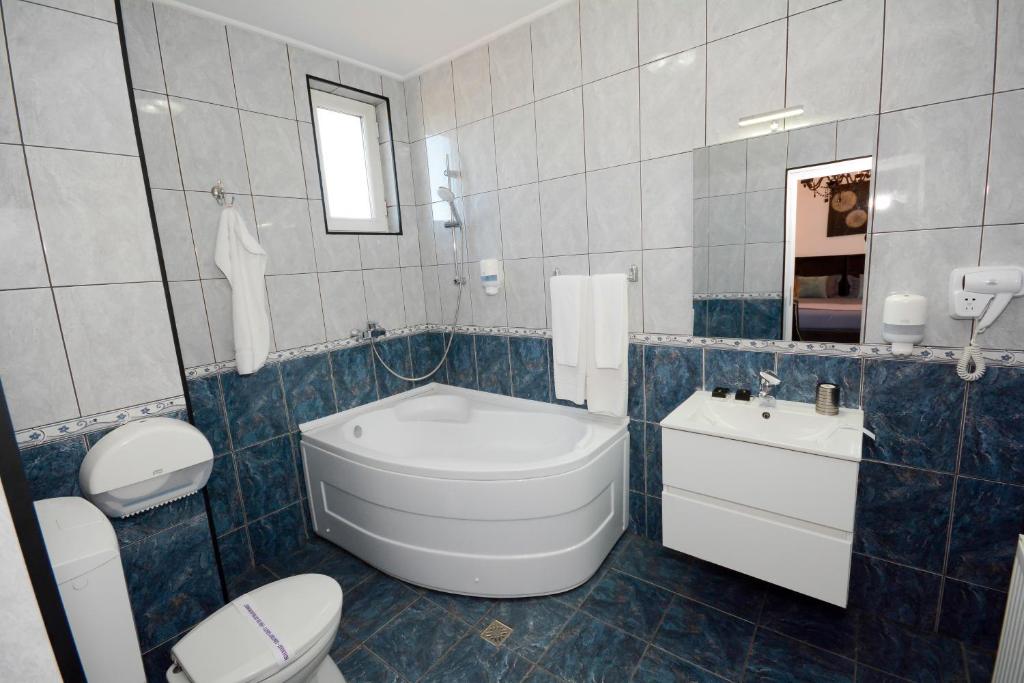 Koupelna v ubytování Hotel Andre´s