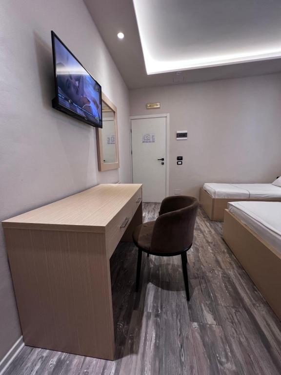TV a/nebo společenská místnost v ubytování Hotel Lungomare