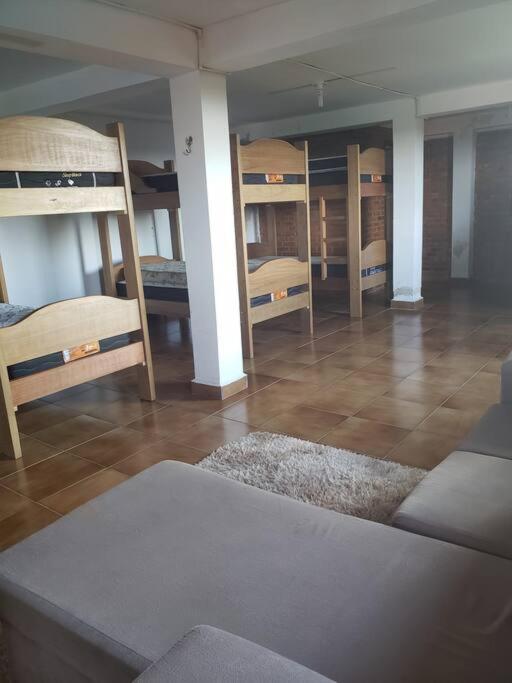 Postel nebo postele na pokoji v ubytování Chácara, próx a SP, com WI-FI e uma vista incrível