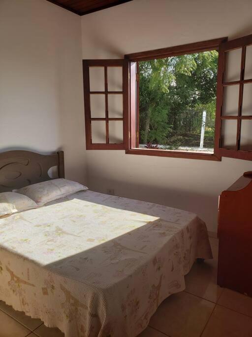Postel nebo postele na pokoji v ubytování Chácara, próx a SP, com WI-FI e uma vista incrível