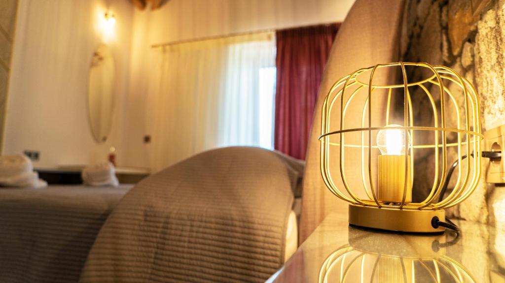 Łóżko lub łóżka w pokoju w obiekcie Lithoessa Luxury Apartments