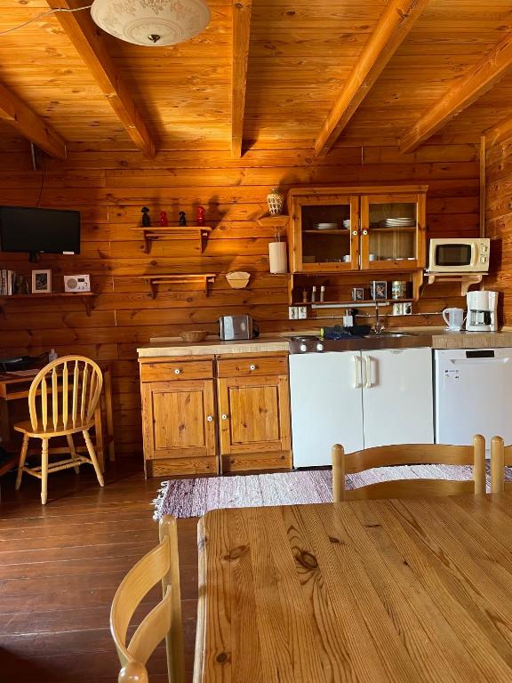Kuchyň nebo kuchyňský kout v ubytování Kaldbaks-kot cottages