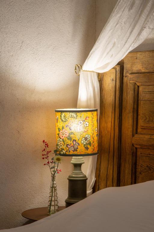 Postel nebo postele na pokoji v ubytování Les Tables de La Rousse