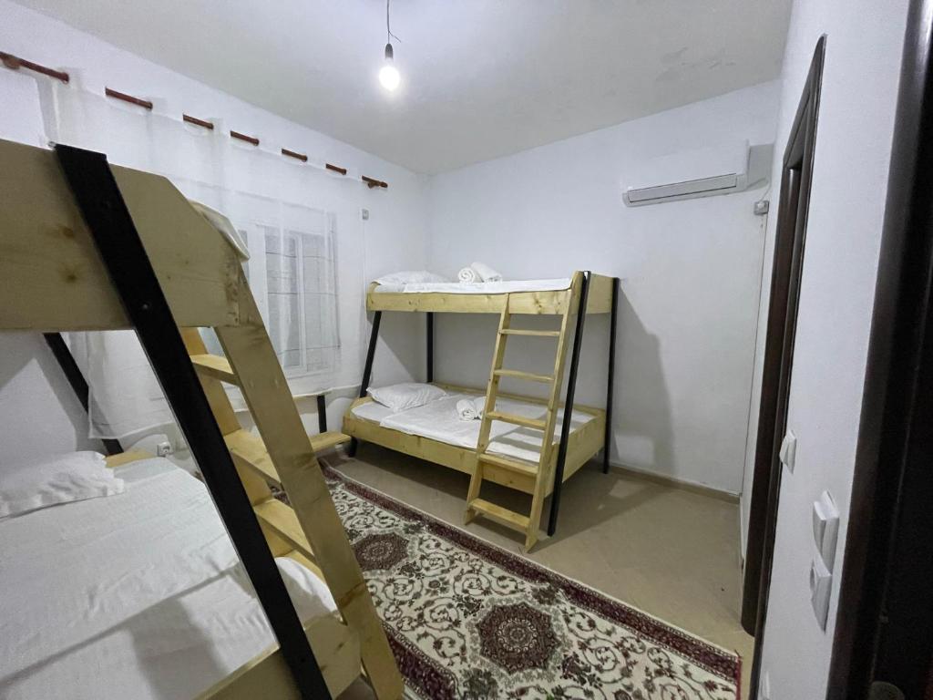 Postel nebo postele na pokoji v ubytování Ani Hostel