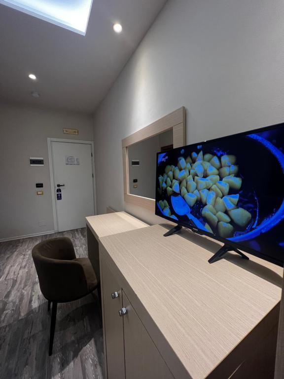 TV a/nebo společenská místnost v ubytování Hotel Lungomare