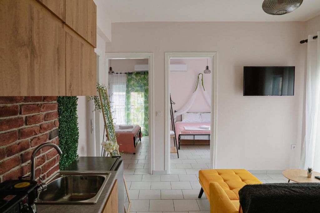 TV a/nebo společenská místnost v ubytování 'Anassa Residence