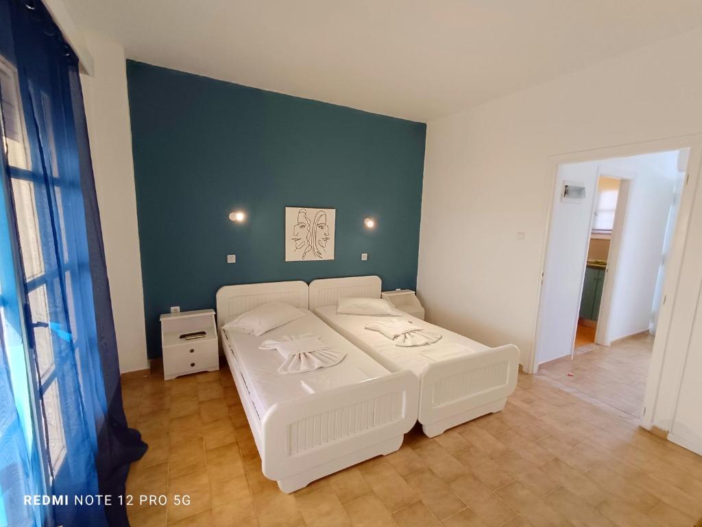 Postel nebo postele na pokoji v ubytování Spasmata Village Apartments no cooking