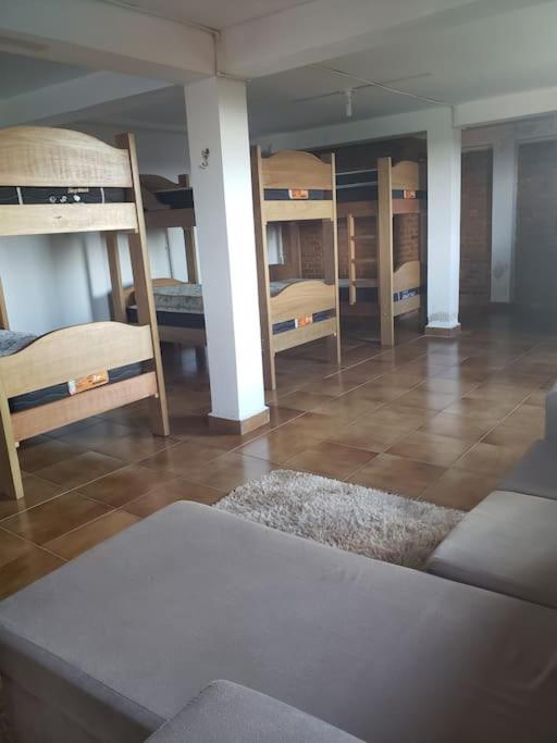 Postel nebo postele na pokoji v ubytování Chácara, próx a SP, com WI-FI e uma vista incrível
