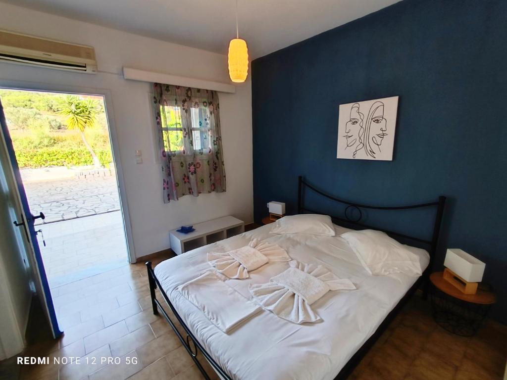 Postel nebo postele na pokoji v ubytování Spasmata Village Apartments no cooking