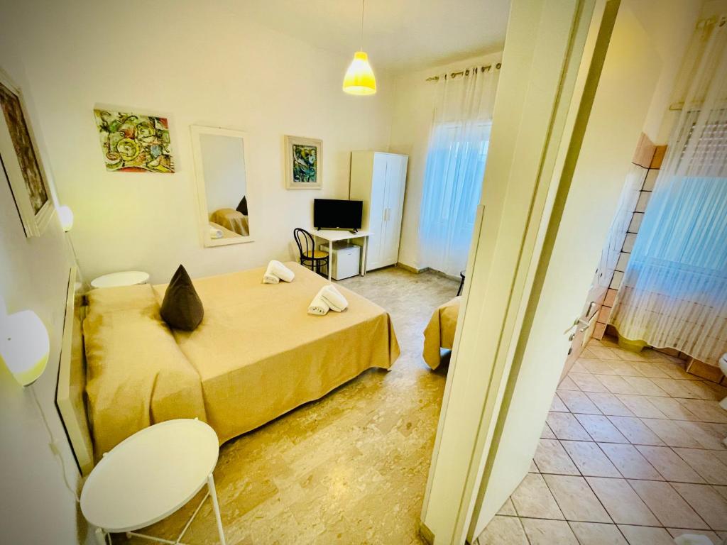 Letto o letti in una camera di Minturnae Hotel