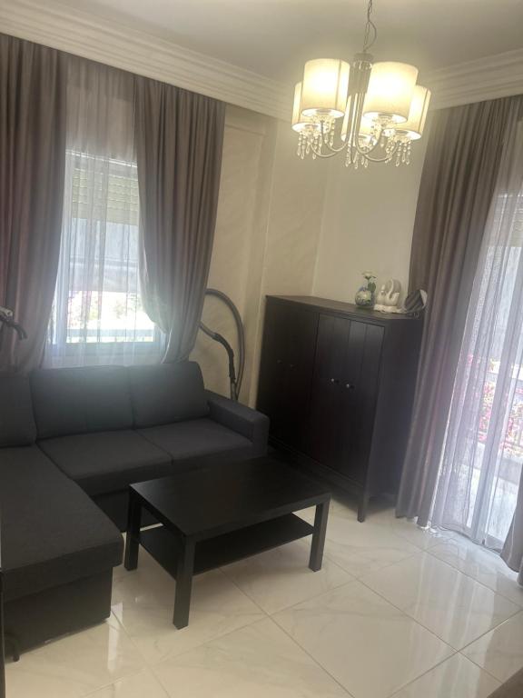 Posezení v ubytování Vasilev Apartment, Nea Kallikratia