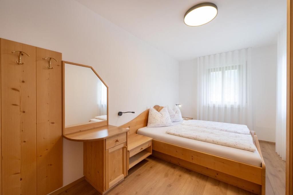 Postel nebo postele na pokoji v ubytování Marolhof