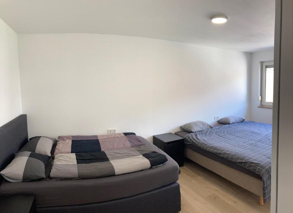 Ένα ή περισσότερα κρεβάτια σε δωμάτιο στο Geräumiges Apartment mit Weitblick 1-6 Personen