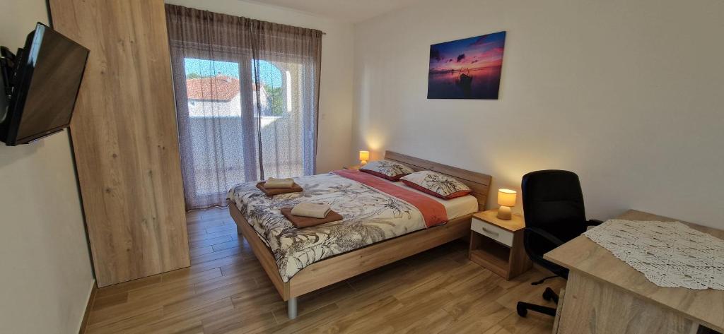 Postel nebo postele na pokoji v ubytování Villa Martina