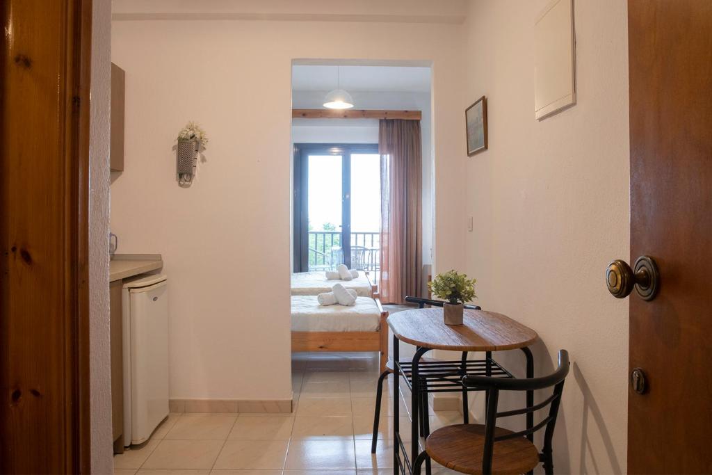 Kuchyň nebo kuchyňský kout v ubytování Manos Kritikakis Apartments