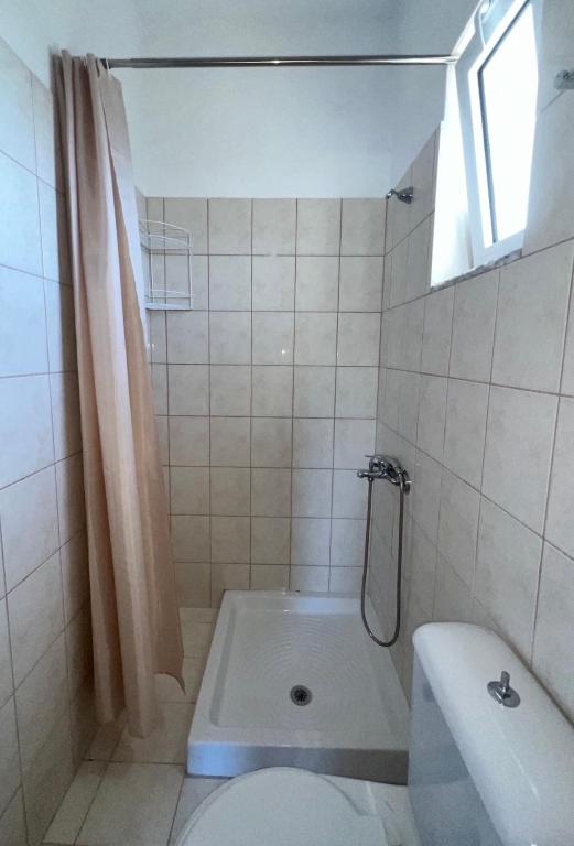 Koupelna v ubytování Gemini Apartment