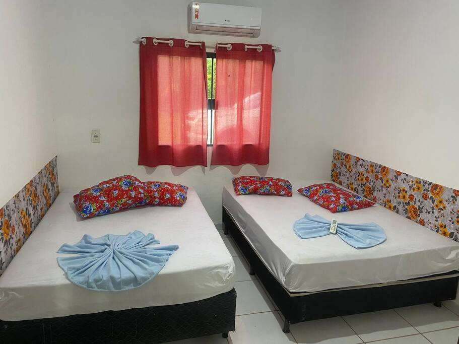 Ένα ή περισσότερα κρεβάτια σε δωμάτιο στο Aconhengo do Altíssimo