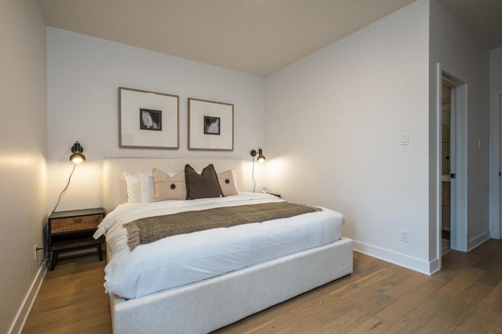 Postel nebo postele na pokoji v ubytování Tremblant Prestige - Verbier 4-102