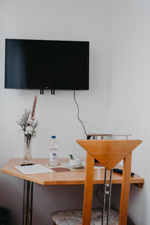 TV a/nebo společenská místnost v ubytování Hotel-Gasthof Zur Krone