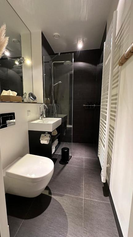 Koupelna v ubytování Luxe B&B "In de Schulp", ontspan en geniet van comfort en stijl
