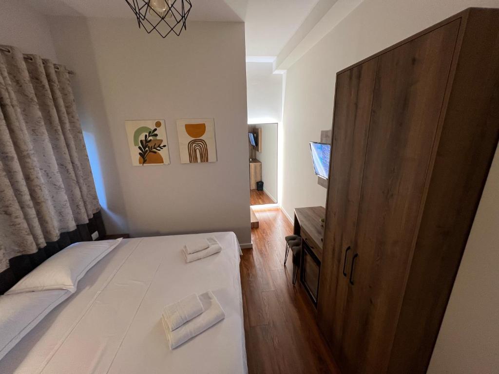Postel nebo postele na pokoji v ubytování Elona's Rooms