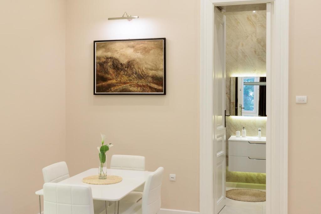 Postel nebo postele na pokoji v ubytování Apartman Mirakul