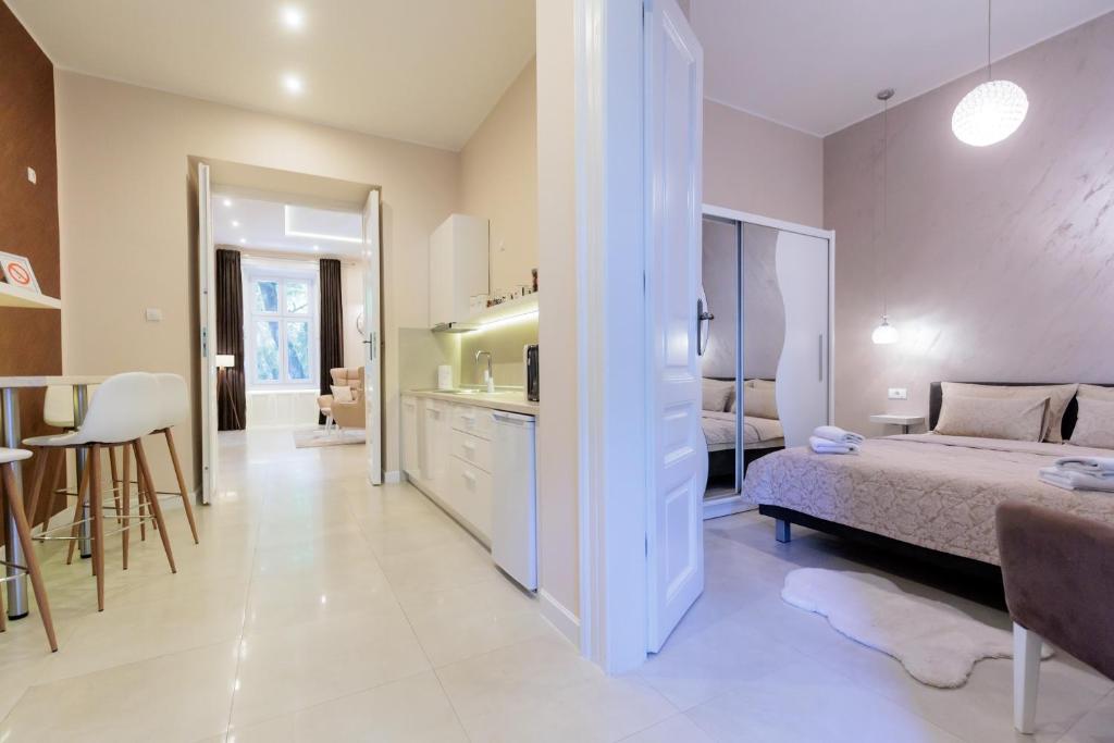 Postel nebo postele na pokoji v ubytování Apartman Mirakul