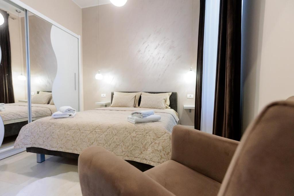 Postel nebo postele na pokoji v ubytování Apartman Mirakul