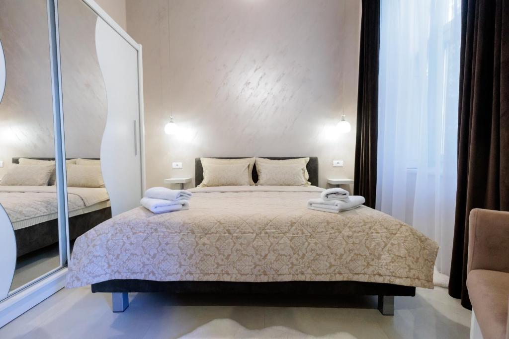Postel nebo postele na pokoji v ubytování Apartman Mirakul