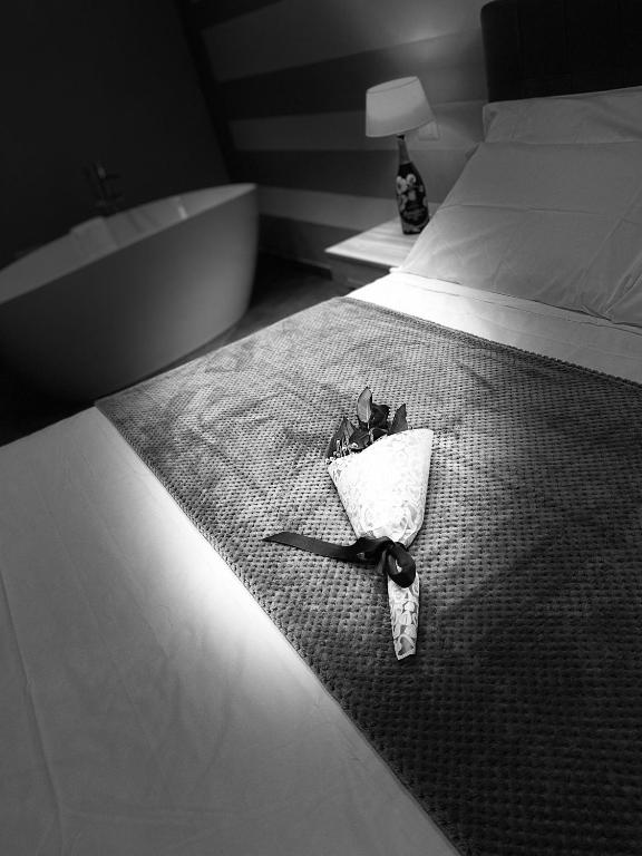 Postel nebo postele na pokoji v ubytování VIVERONE LAKE ROOMS