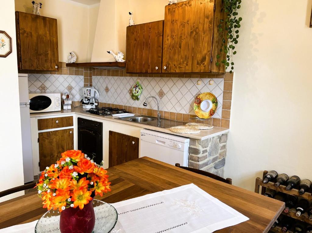 Kuchyň nebo kuchyňský kout v ubytování Casina di Desiree e Aurora