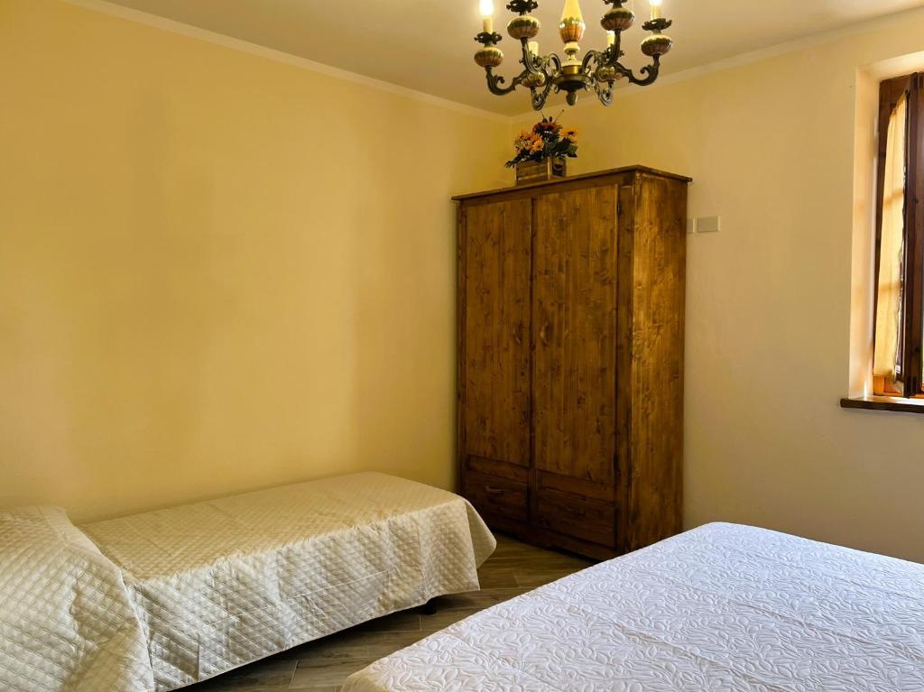 Postel nebo postele na pokoji v ubytování Casina di Desiree e Aurora
