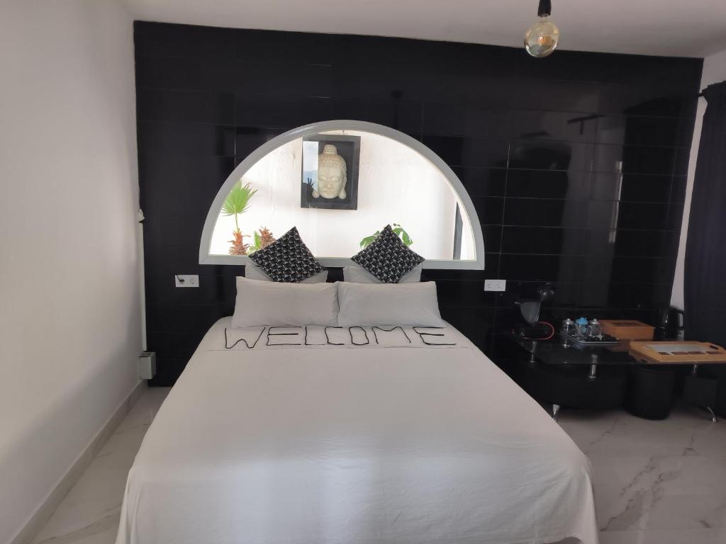 Posteľ alebo postele v izbe v ubytovaní Pinar Suites Habitaciones